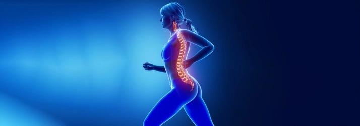 A digital illustration of a person in motion with a highlighted spine, symbolizing spinal health and mobility.